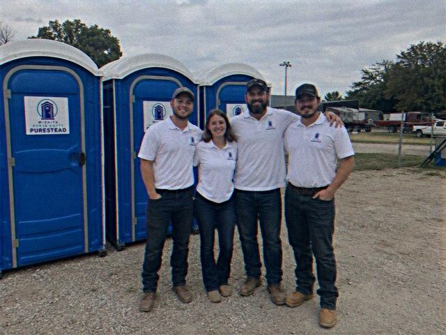 Wichita Porta Potty Purestead crew with portable restroom units